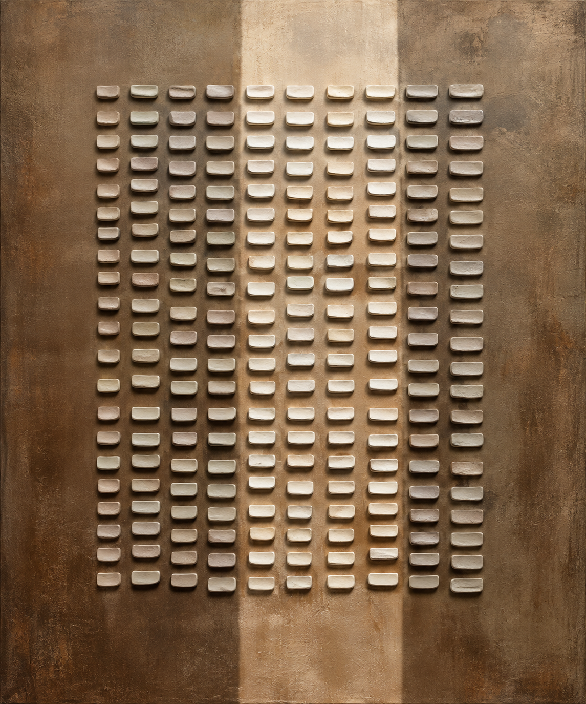 Close-up of KORUM handmade bronze background and raised ivory relief blocks