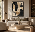 MOREA black and sand organic abstract wall art above a neutral sofa